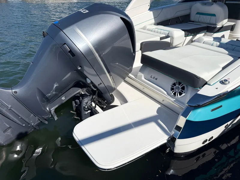 Slide: The Image of Interior of a 2022 Regal LX4 boat on water. - 6