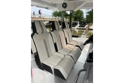 Slide: The Image of 2021 Jeanneau Leader 12.5 WA boat interior with modern seating design. - 15