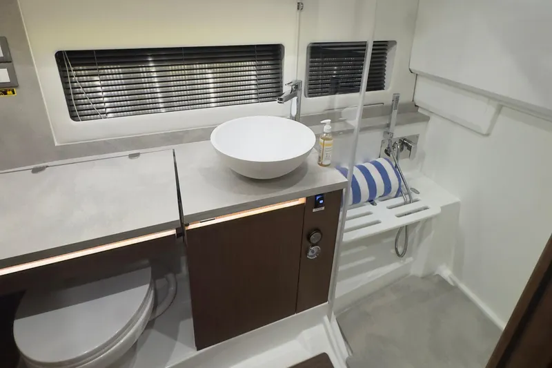 Slide: The Image of Modern bathroom interior of 2021 Jeanneau Leader 12.5 WA yacht, featuring sleek fixtures and elegant design. - 36