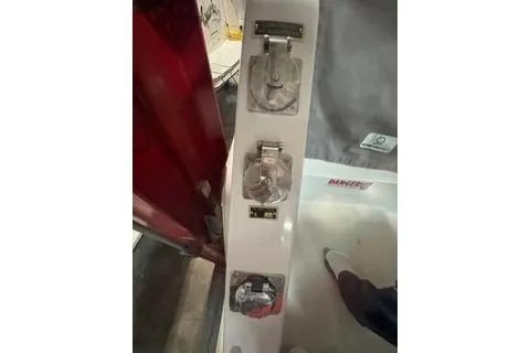 Slide: The Image of Control panel on a 2021 Jeanneau Leader 12.5 WA boat, featuring switches and dials. - 38