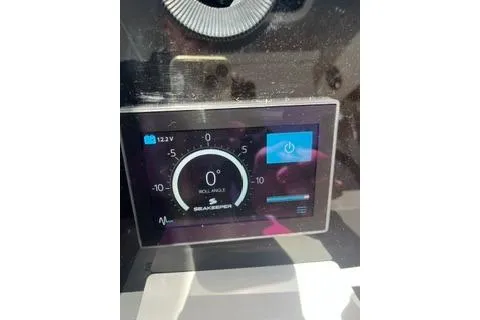 Slide: The Image of Digital display on 2021 Jeanneau Leader 12.5 WA boat dashboard showing navigation data. - 18