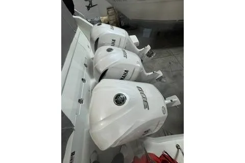 Slide: The Image of 2021 Jeanneau Leader 12.5 WA with triple Yamaha outboard engines. - 28