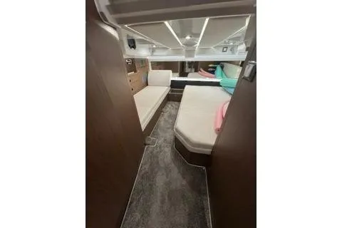Slide: The Image of Interior cabin of 2021 Jeanneau Leader 12.5 WA, featuring modern design and comfortable seating. - 32