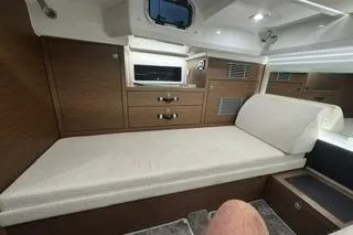 Slide: The Image of 2021 Jeanneau Leader 12.5 WA cabin interior with modern wood finish and comfortable seating. - 34