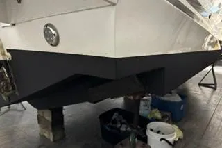 Slide: The Image of 2021 Jeanneau Leader 12.5 WA boat hull in maintenance setting. - 39