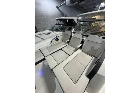 Slide: The Image of 2021 Jeanneau Leader 12.5 WA boat interior with sleek seating arrangement. - 10