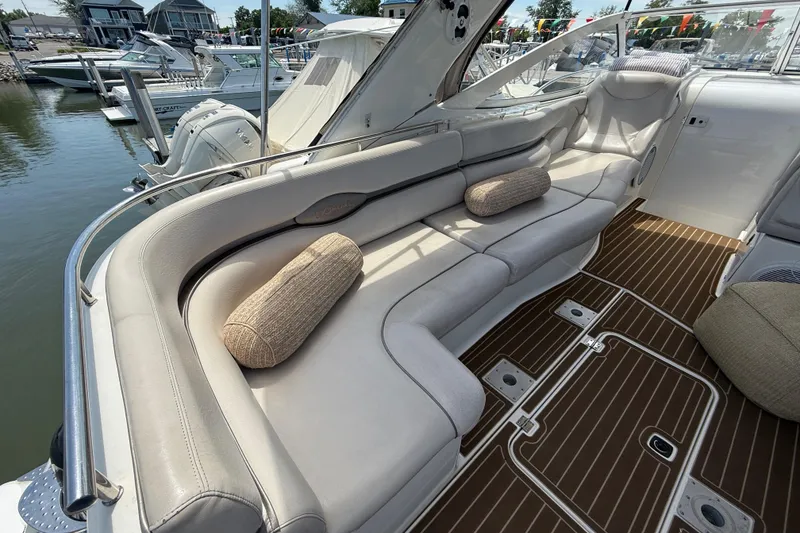 Slide: The Image of Luxurious seating area on a 2001 Doral 330se yacht, featuring plush cushions and elegant design. - 5