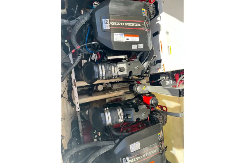 Slide: The Image of Twin Volvo Penta engines in a 2015 Regal 30 Express boat. - 25