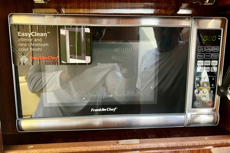 Slide: The Image of Franklin Chef microwave with EasyClean interior, installed in a 2015 Regal 30 Express boat. - 26