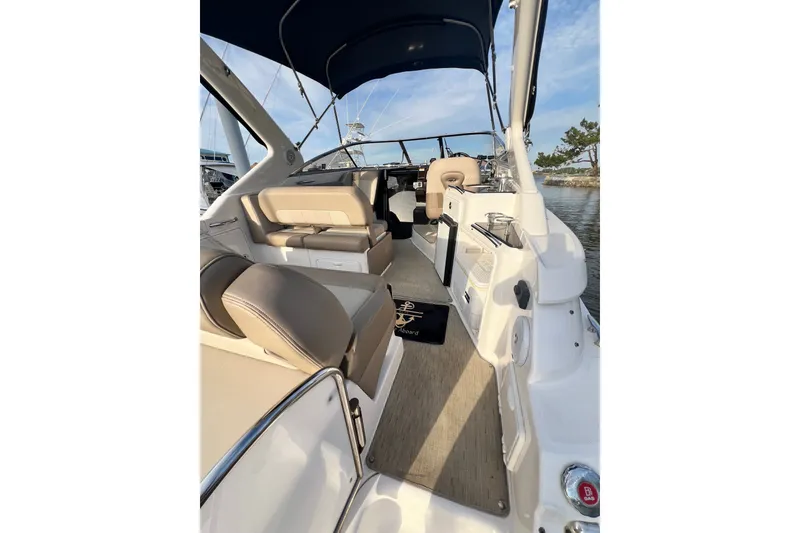 Slide: The Image of Interior view of a 2015 Regal 30 Express boat with seating and helm. - 17