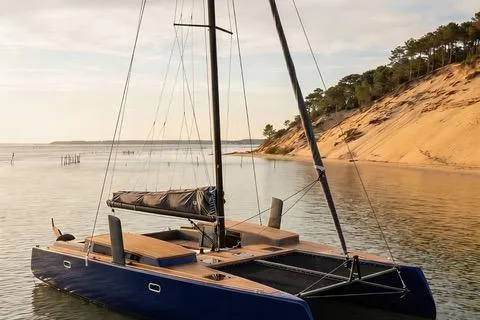 The Image of 2027 Black Pepper C38 sailboat near sandy shore. - 1