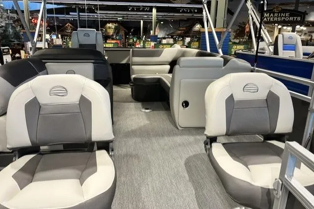 Slide: The Image of 2026 Sun Tracker Fishin' Barge 20 DLX interior with comfortable seating and modern design. - 7