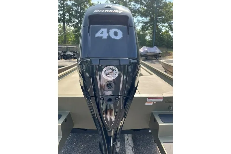 Slide: The Image of 2026 Tracker Grizzly 1654 T Sportsman boat with Mercury 40 HP outboard motor. - 6