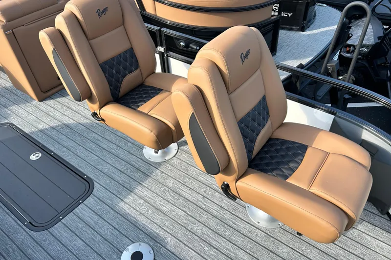 Slide: The Image of 2026 Ranger 223FC boat seats with tan and black diamond-pattern upholstery. - 8