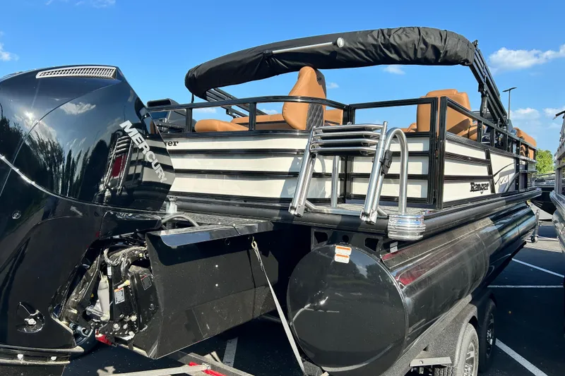 Slide: The Image of 2026 Ranger 223FC pontoon boat with Mercury engine, featuring sleek design and comfortable seating. - 2
