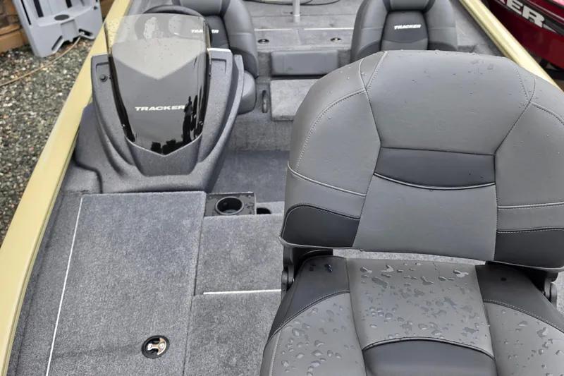 Slide: The Image of 2026 Tracker Pro Team 195 boat interior with gray seating and sleek design. - 2