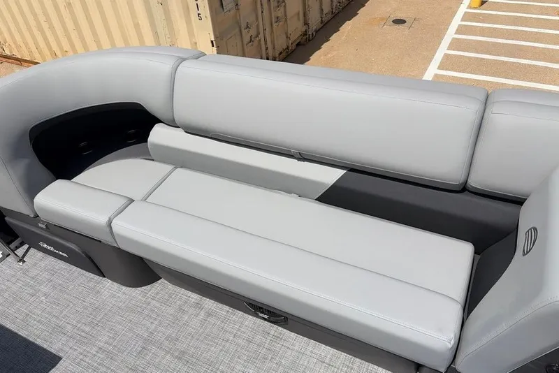 Slide: The Image of 2026 Sun Tracker Party Barge 20 DLX with sleek gray seating and spacious layout. - 10