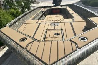 Slide: The Image of 2026 Tracker Grizzly 1756 T Marsh boat with spacious deck and camo design. - 4