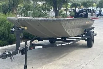 The Image of 2026 Tracker Grizzly 1756 T Marsh boat on trailer in outdoor setting. - 0