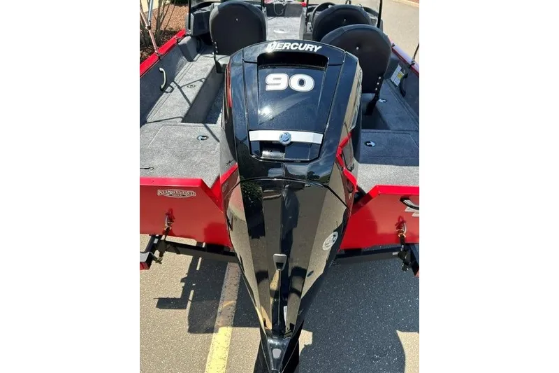 Slide: The Image of 2026 Tracker Pro Guide V-16 WT boat with Mercury 90 engine, red and gray interior. - 3