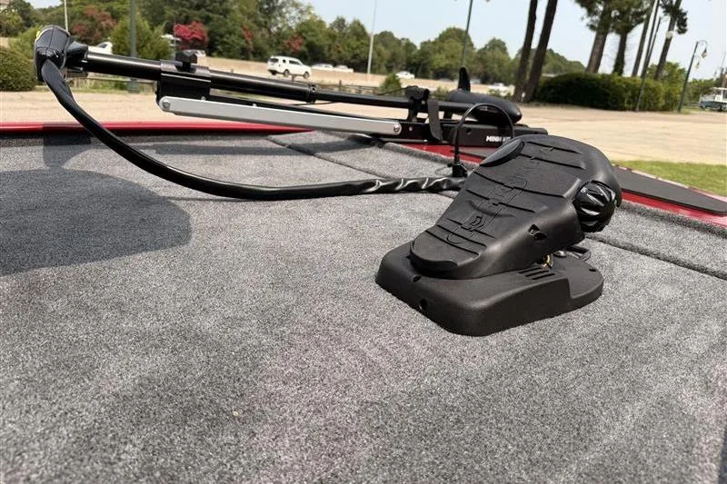 Slide: The Image of 2026 Tracker Bass Tracker Classic XL boat deck with trolling motor pedal. - 7
