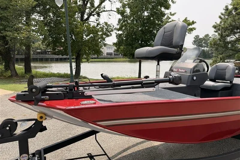 The Image of 2026 Tracker Bass Tracker Classic XL boat by a serene lake. - 1
