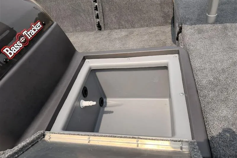 Slide: The Image of 2026 Tracker Bass Tracker Classic XL boat interior with storage compartment. - 15