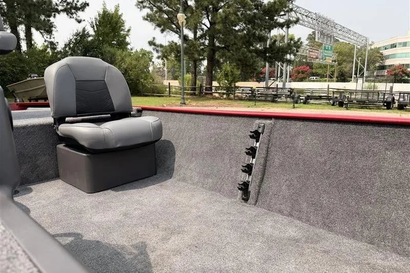Slide: The Image of 2026 Tracker Bass Tracker Classic XL boat interior with gray seating and carpeted flooring. - 10