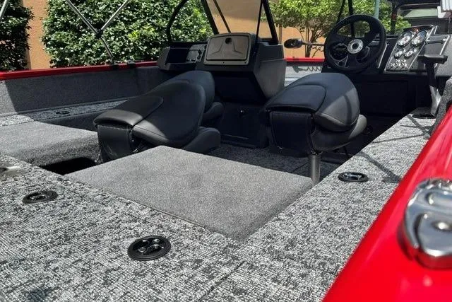 Slide: The Image of 2026 Tracker Pro Guide V-175 Combo boat interior with modern seating and dashboard. - 8