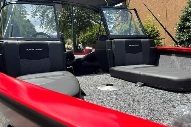 Slide: The Image of 2026 Tracker Pro Guide V-175 Combo boat interior with seating and windshield. - 4