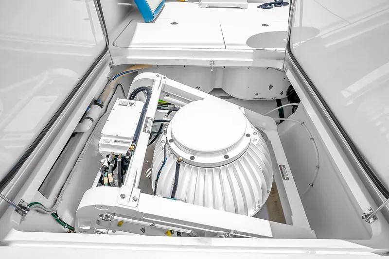 Slide: The Image of Engine compartment of 2008 Hatteras 77 Convertible yacht, showcasing mechanical components. - 108