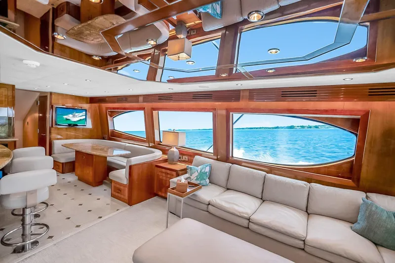 Slide: The Image of Luxurious interior of 2008 Hatteras 77 Convertible yacht with ocean view windows. - 47