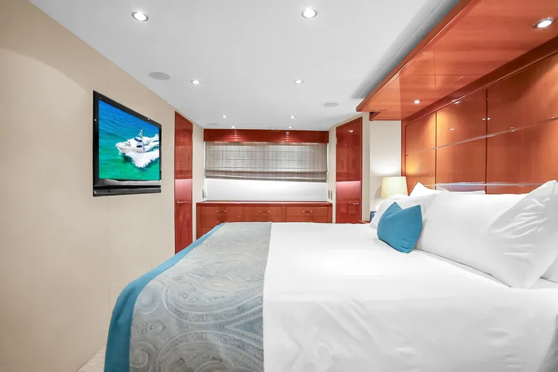 Slide: The Image of Luxurious bedroom interior of 2008 Hatteras 77 Convertible yacht with modern decor. - 52