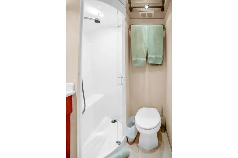 Slide: The Image of Bathroom interior of 2008 Hatteras 77 Convertible yacht with shower and toilet. - 75