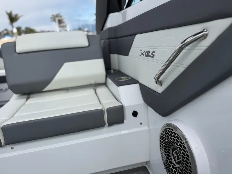 Slide: The Image of 2023 Cruisers Yachts 34 GLS I/O interior with sleek seating and modern design. - 28