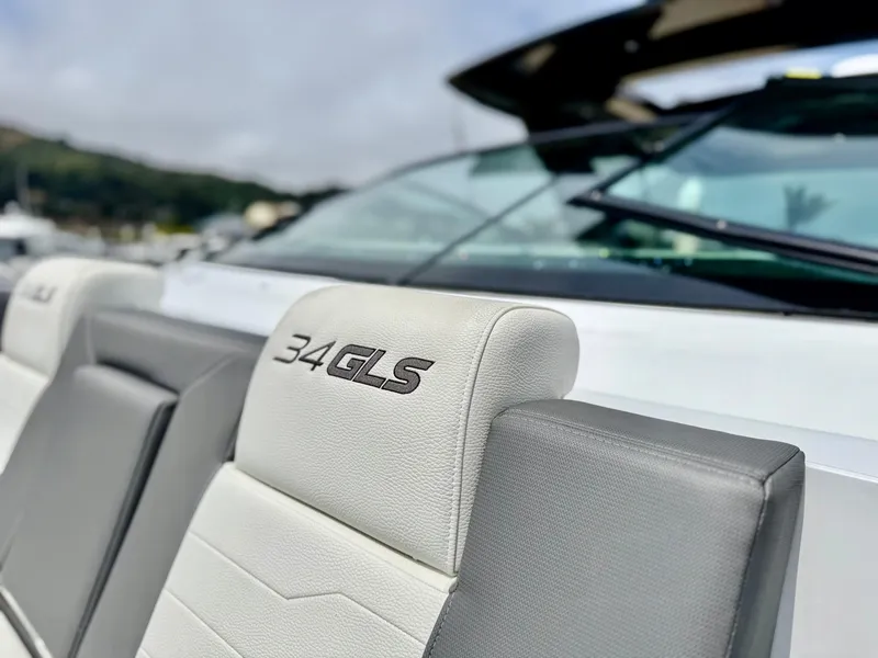 Slide: The Image of 2023 Cruisers Yachts 34 GLS I/O boat seat detail with logo. - 38