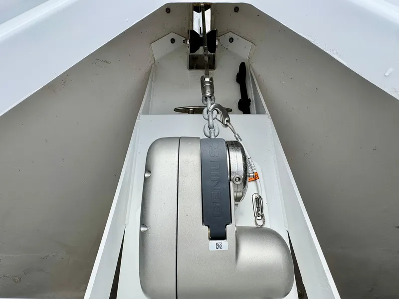 Slide: The Image of 2023 Cruisers Yachts 34 GLS I/O anchor system, featuring a modern winch and chain setup. - 47