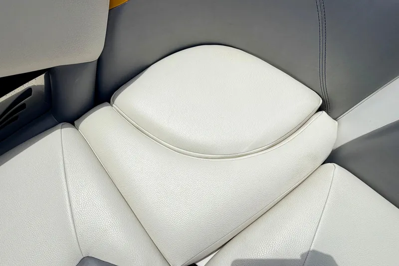 Slide: The Image of 2014 Tigé R20 boat interior with white and gray leather seating. - 35