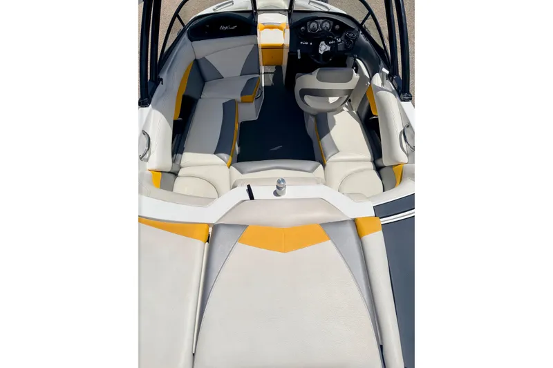 Slide: The Image of 2014 Tigé R20 boat interior with modern seating and sleek dashboard design. - 71