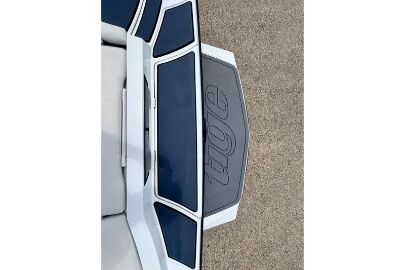 Slide: The Image of Top view of a boat with Tigé logo on the platform. - 28
