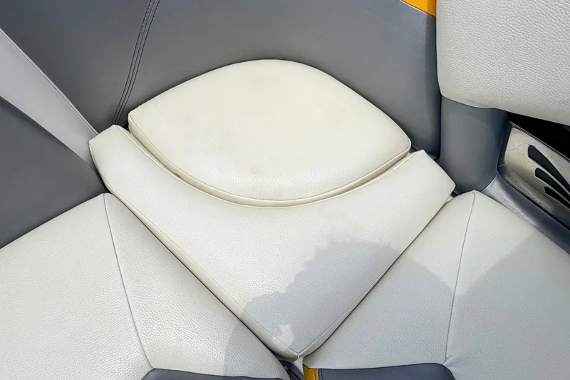 Slide: The Image of 2014 Tigé R20 boat interior with white and gray cushioned seating. - 37
