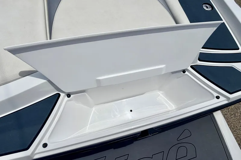 Slide: The Image of 2014 Tigé R20 boat storage compartment with sleek design and modern features. - 24