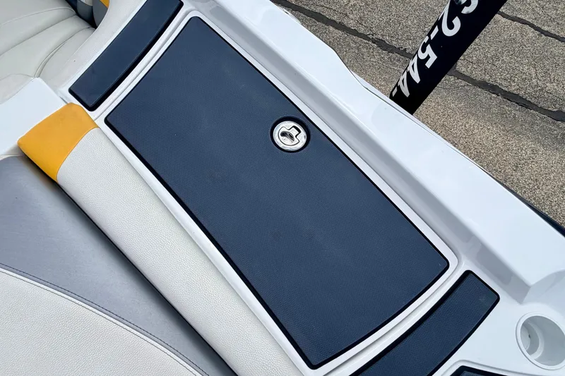 Slide: The Image of Close-up of a boat deck with gray padding and white trim. - 25