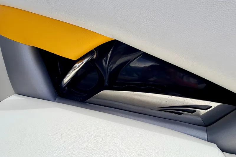 Slide: The Image of Interior detail of 2014 Tigé R20 boat, featuring sleek design and vibrant upholstery. - 34
