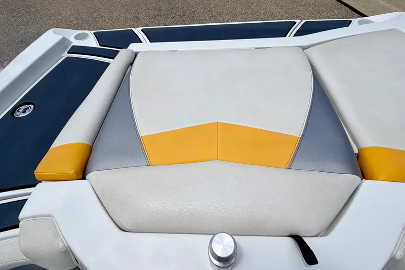 Slide: The Image of 2014 Tigé R20 boat seat with yellow and gray accents, showcasing modern design. - 29