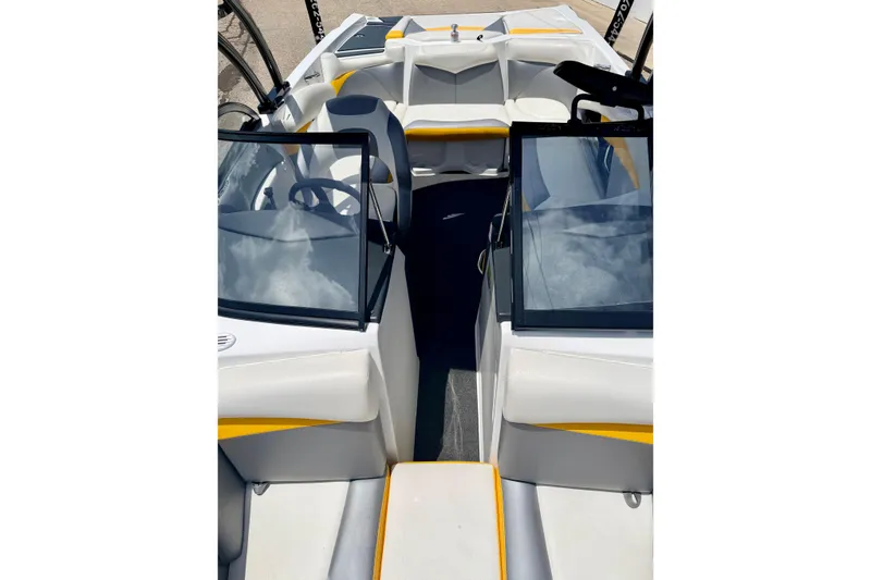 Slide: The Image of 2014 Tigé R20 boat interior with sleek design and comfortable seating. - 66