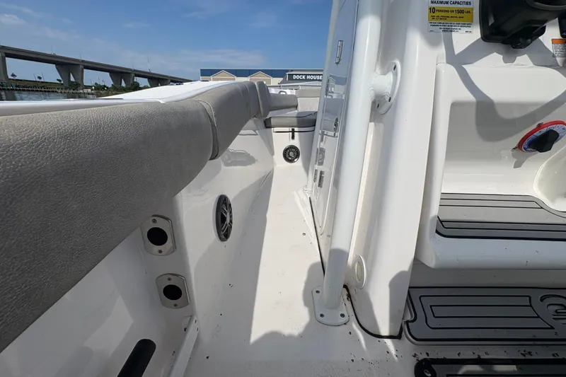 Slide: The Image of 2022 Sea Fox 248 Commander boat interior, featuring seating and deck details. - 16