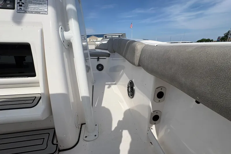 Slide: The Image of 2022 Sea Fox 248 Commander boat interior with seating and control panel. - 17