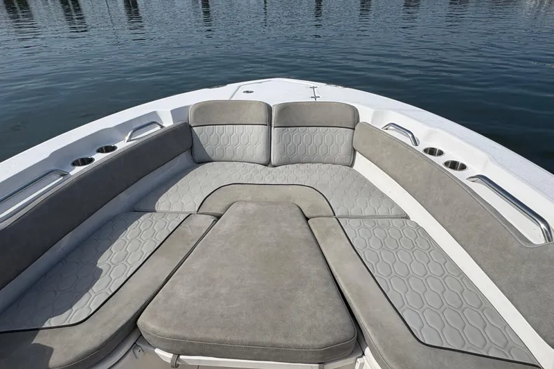 Slide: The Image of Bow seating area of 2022 Sea Fox 248 Commander boat with gray upholstery. - 5