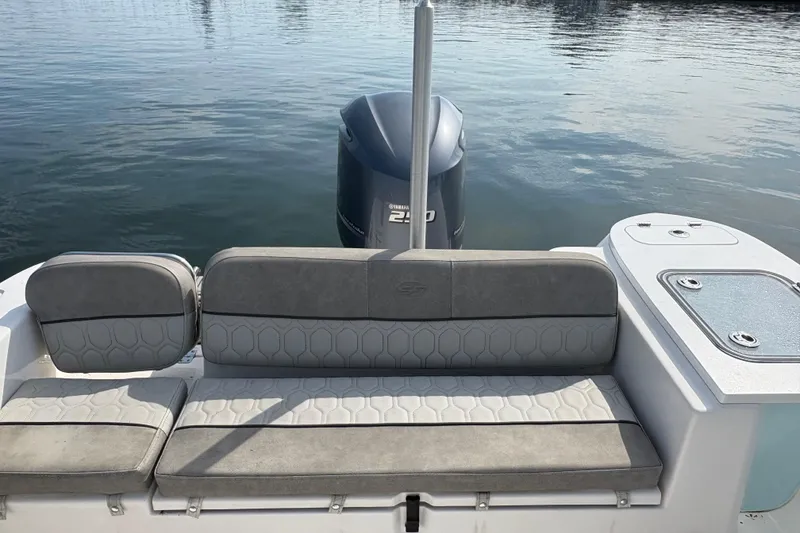 Slide: The Image of 2022 Sea Fox 248 Commander boat with cushioned seating and Yamaha outboard motor. - 7